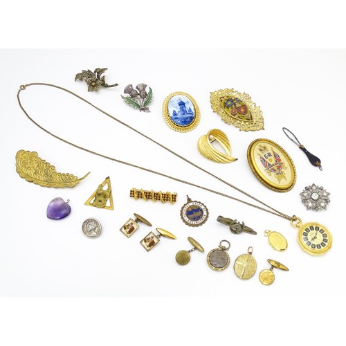 724A - A quantity of assorted jewellery to include brooches, pendants, cufflinks including a gilt metal pen... 