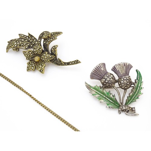 724A - A quantity of assorted jewellery to include brooches, pendants, cufflinks including a gilt metal pen... 