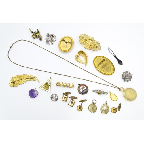 724A - A quantity of assorted jewellery to include brooches, pendants, cufflinks including a gilt metal pen... 