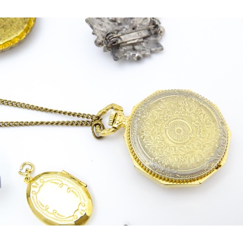 724A - A quantity of assorted jewellery to include brooches, pendants, cufflinks including a gilt metal pen... 