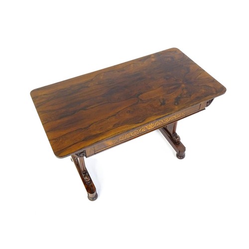 1434 - A 19thC rosewood centre table of exceptional quality, the figured rosewood top above a single frieze... 