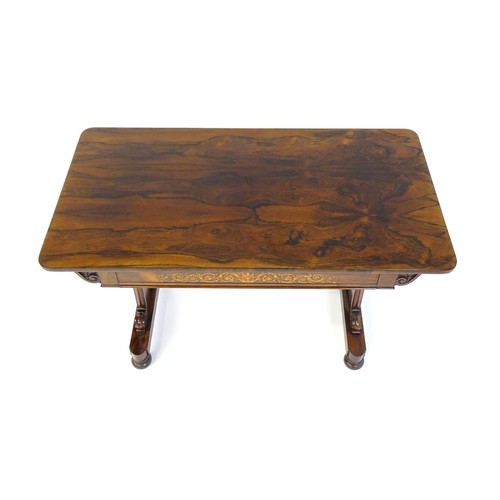 1434 - A 19thC rosewood centre table of exceptional quality, the figured rosewood top above a single frieze... 