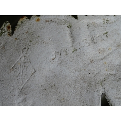 1307 - A Victorian cast iron chair with fern decoration. Marked with Victorian registration diamond and No.... 