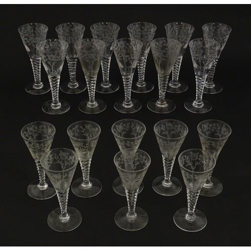 295 - A quantity of various crystal drinking glasses with cut decoration and etched rose detail, to includ... 