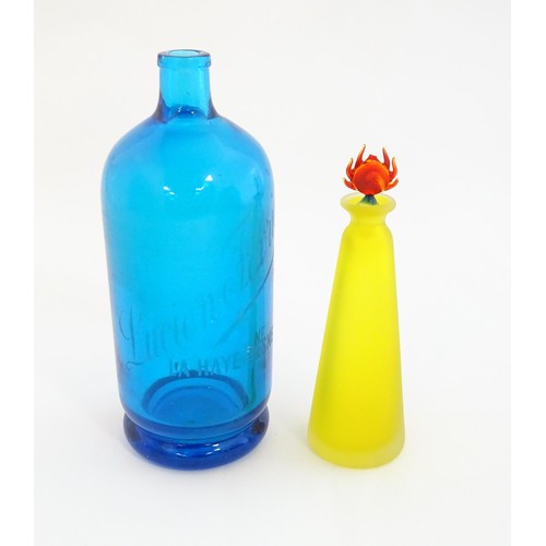 247 - An art glass scent bottle of conical form with yellow, orange and blue detail. Together with a Frenc... 