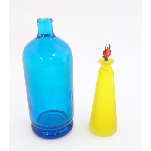 247 - An art glass scent bottle of conical form with yellow, orange and blue detail. Together with a Frenc... 