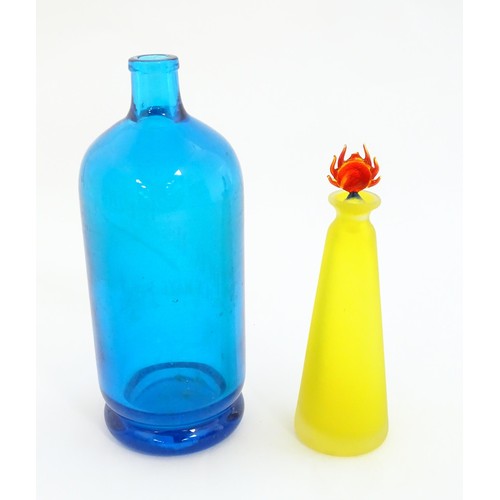 247 - An art glass scent bottle of conical form with yellow, orange and blue detail. Together with a Frenc... 