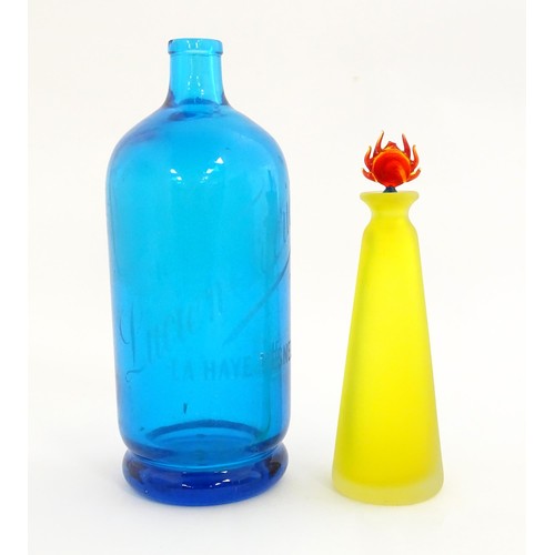 247 - An art glass scent bottle of conical form with yellow, orange and blue detail. Together with a Frenc... 