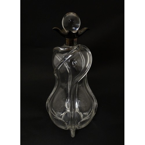 249 - A Victorian shaped glass decanter with trail detail, with silver collar hallmarked London 1896, make... 