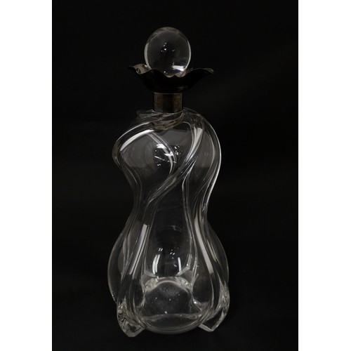 249 - A Victorian shaped glass decanter with trail detail, with silver collar hallmarked London 1896, make... 