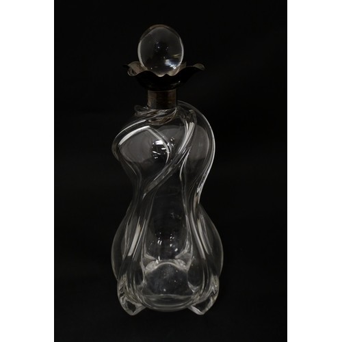 249 - A Victorian shaped glass decanter with trail detail, with silver collar hallmarked London 1896, make... 