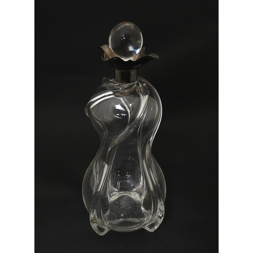 249 - A Victorian shaped glass decanter with trail detail, with silver collar hallmarked London 1896, make... 