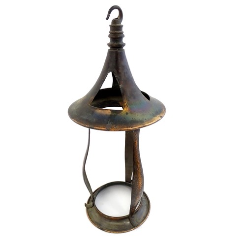 1055 - An Arts & Crafts copper pendant light frame of lantern form, the copper supports with hammered decor... 