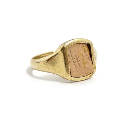 615 - Masonic / Freemasonry Interest: A 9ct gold Masonic swivel ring, the central rotating section with en... 