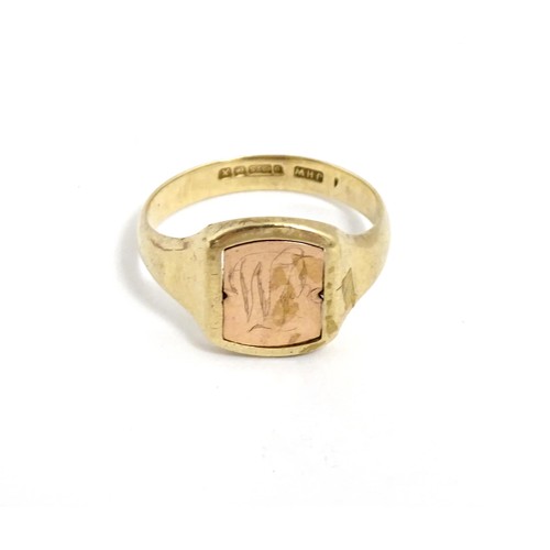 615 - Masonic / Freemasonry Interest: A 9ct gold Masonic swivel ring, the central rotating section with en... 