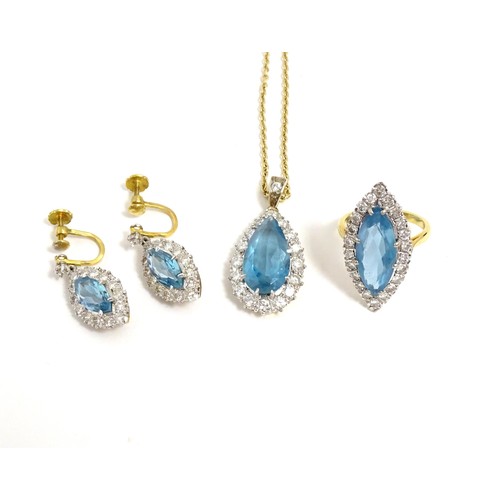 621 - An 18ct gold suite of jewellery comprising ring, pendant necklace and drop earrings, all set with ce... 