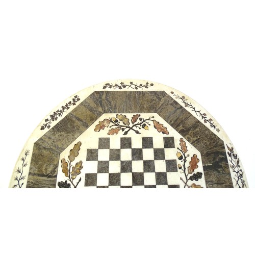 1441 - A marble games table / occasional table with a circular top and inlaid marble decoration. The top ha... 