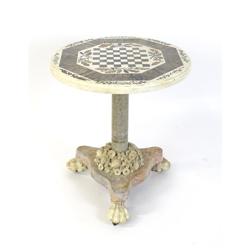 1441 - A marble games table / occasional table with a circular top and inlaid marble decoration. The top ha... 