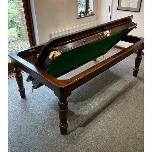 1559 - A 20thC oak combination dining / snooker table, with revolving mechanism and slate base, approx 84 1... 