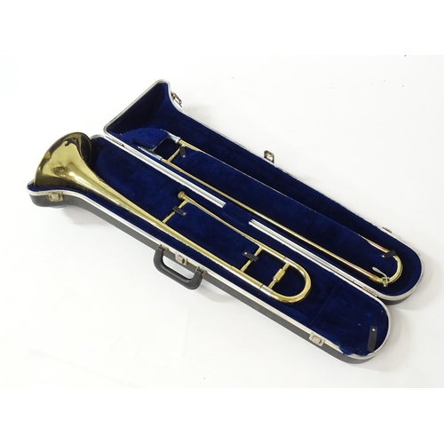 20 - A late 20thC Blessing Scholastic trombone, approx  45