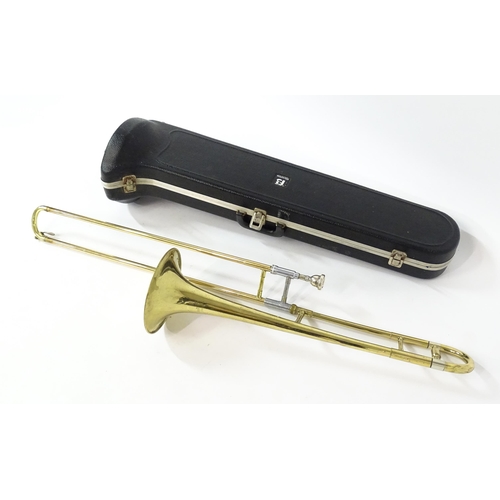 20 - A late 20thC Blessing Scholastic trombone, approx  45