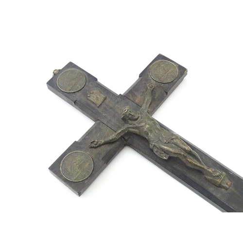 62 - An early 20thC crucifix with cast Corpus Christi / Jesus Christ, INRI banner, and five medallions, f... 