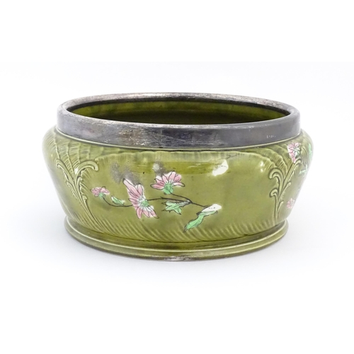 68 - A German Imperial Bonn shallow planter with silver plate rim, the body with floral decoration. Marke... 