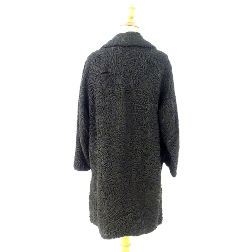 100 - Vintage fashion / clothing: A beaver lamb / mouton fur style coat, button fastening to the front, bu... 