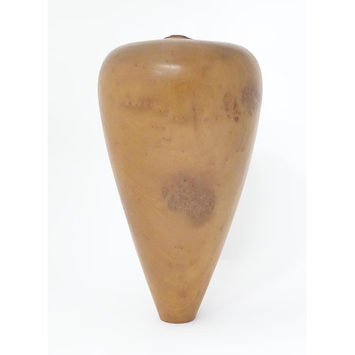 133 - A wooden vase of tapering form. Approx. 16