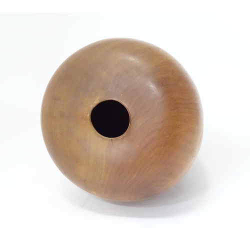 133 - A wooden vase of tapering form. Approx. 16