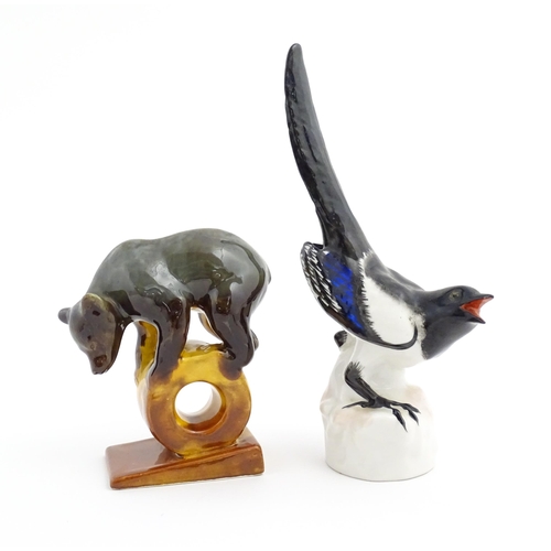 142 - Two Russian / USSR models of animals to include a bear by Konakovo, and a magpie bird by Lomonosov. ... 