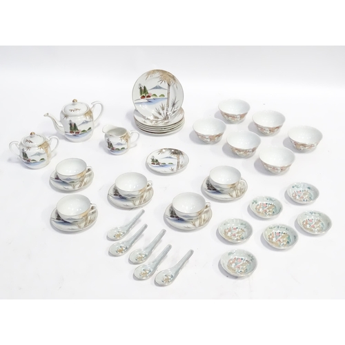 158 - A quantity of assorted Oriental ceramics decorated with dragons / landscapes, to include teapot, sug... 