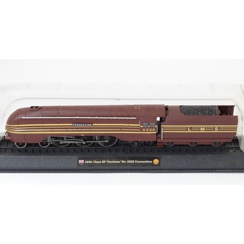 169 - Toys - Model Railway / Train Interest: A quantity of assorted display / collectors trains / locomoti... 