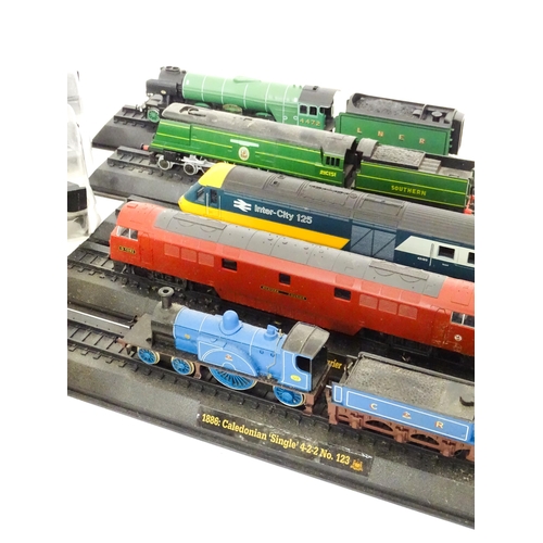 169 - Toys - Model Railway / Train Interest: A quantity of assorted display / collectors trains / locomoti... 