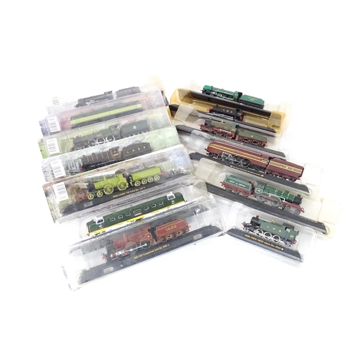 169 - Toys - Model Railway / Train Interest: A quantity of assorted display / collectors trains / locomoti... 