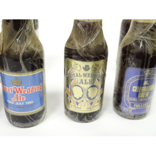 212 - A quantity of late 20thC commemorative bottles of beer / ale / bitter / lager , including brews by E... 