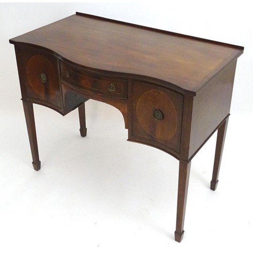 231 - A Georgian style mahogany sideboard with a small upstand above a single short central drawer and fla... 