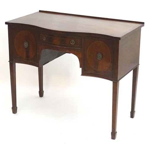 231 - A Georgian style mahogany sideboard with a small upstand above a single short central drawer and fla... 