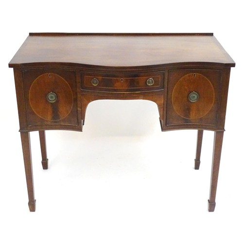 231 - A Georgian style mahogany sideboard with a small upstand above a single short central drawer and fla... 