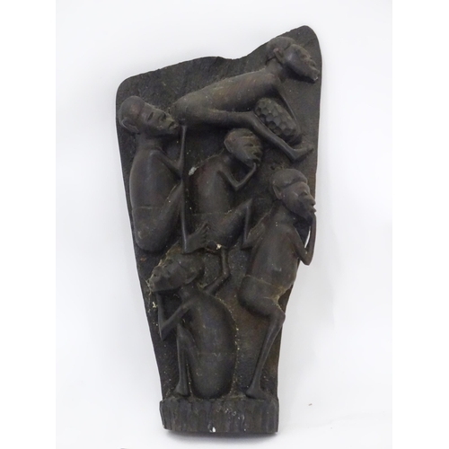 242 - A quantity of assorted tribal items to include figural busts, carved figures, etc.