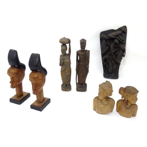 242 - A quantity of assorted tribal items to include figural busts, carved figures, etc.