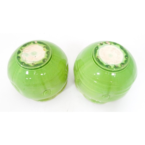 287 - Two green glazed jardinieres / planters with lobed rims and dimple detail. Approx. 7 1/2