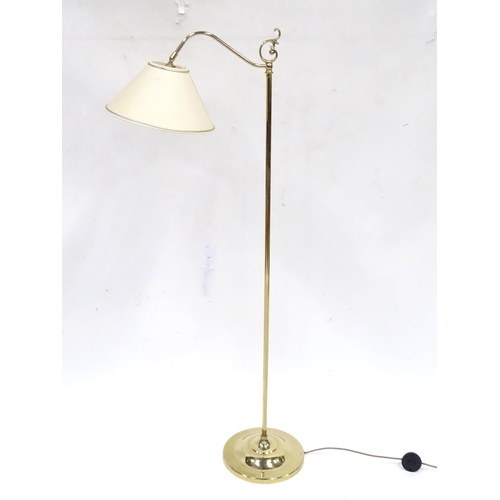 333 - A late 20thC brass standard lamp with white shade, approx 55