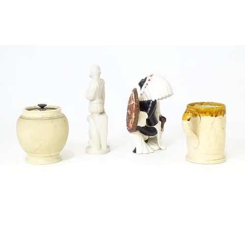 390 - Three ceramic items comprising a two tone tankard with relief detail, tobacco jar, and a Native Amer... 