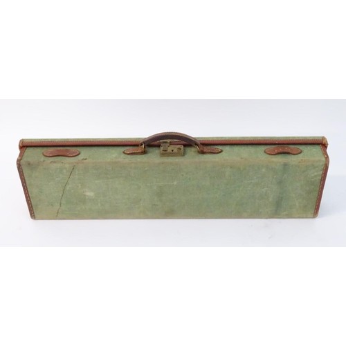 440 - A vintage canvas, leather and brass mounted motor case, with maroon baize lining, provision for 28 1... 