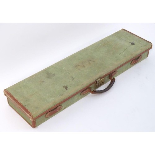 440 - A vintage canvas, leather and brass mounted motor case, with maroon baize lining, provision for 28 1... 