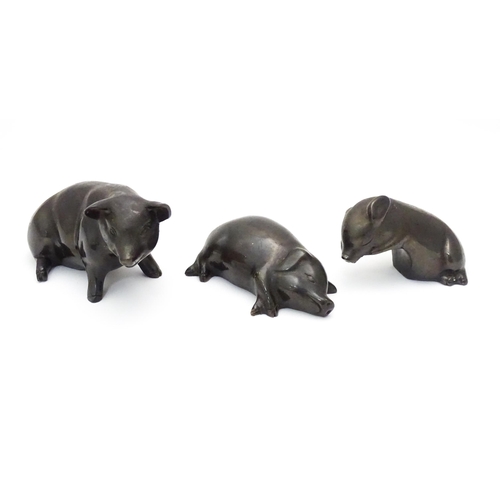 485 - Three cast models of pigs /  piglets . Approx  6