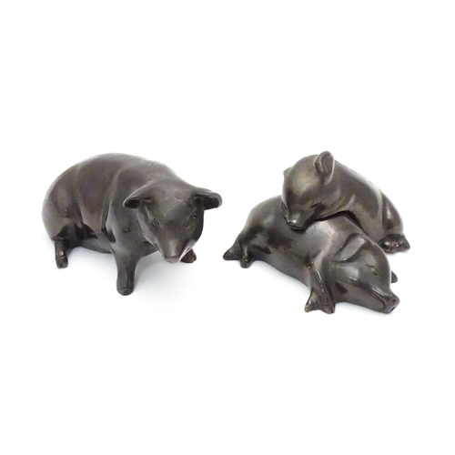 485 - Three cast models of pigs /  piglets . Approx  6