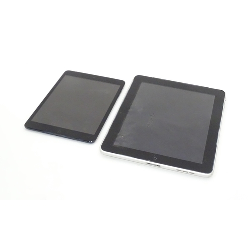 490 - Two Apple iPads to comprising a silver iPad Model A1337 and a black iPad Mini Model A1455 (2)