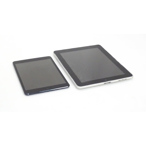 490 - Two Apple iPads to comprising a silver iPad Model A1337 and a black iPad Mini Model A1455 (2)